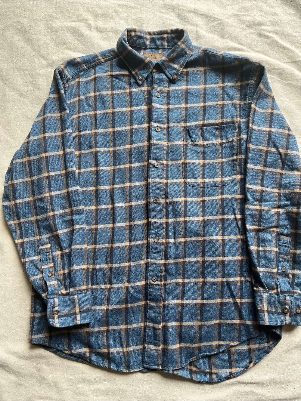 Vintage St. John’s Bay flannel shirt in a classic blue, tan, and brown plaid. M